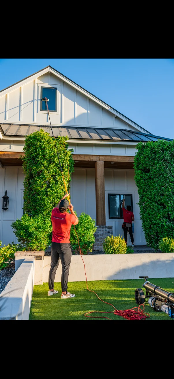 Watermelon Window Washing tech on a residential job in Queen Creek, AZ