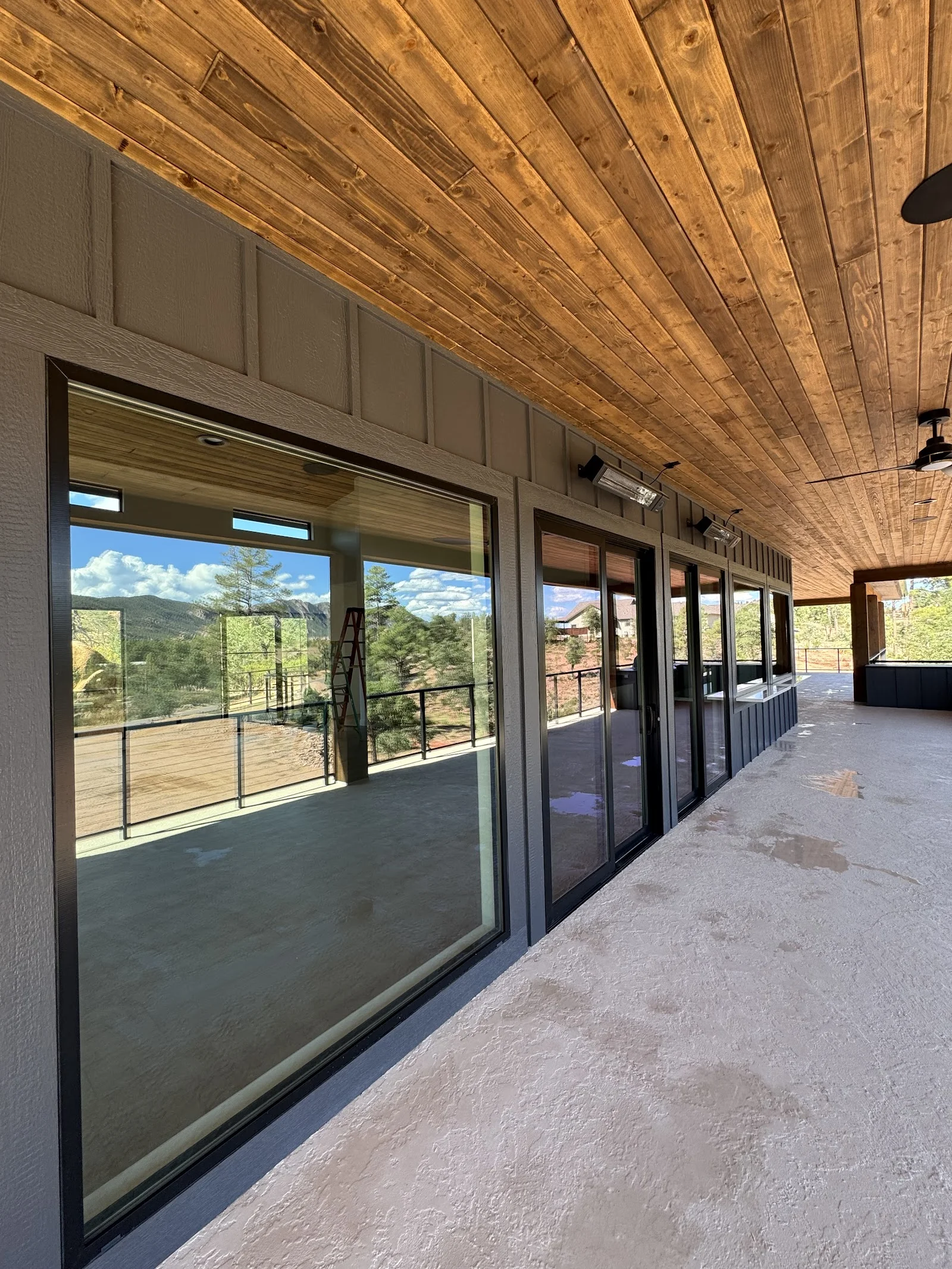 Spotless sliding glass doors at sunset after a Watermelon Window Washing job
